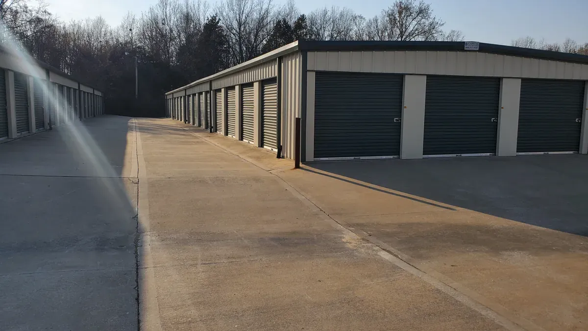 Drive up units at night at Reliable Storage